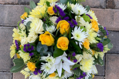 Yellow & purple mixed funeral posy
