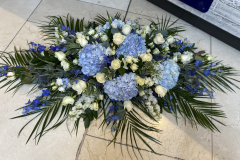 Blue & white flower coffin spray