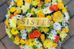yellow & orange funeral posy. Complete with yellow ribbon sister sash