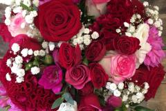 Red & pink rose bridal bouquet with added gyp.