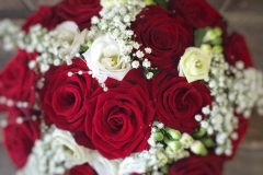 Red Rose bridal bouquet handtied with white roses & gyp.