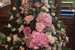 Pink floral & green wedding flower piece