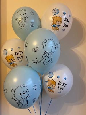 A mix of 6 balloons in white & blue with printed teddies & "baby boy" quotes on.