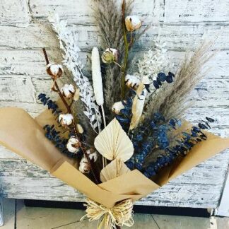 Dried Bouquet including Pampas, Eucalyptus & Cotton. All handtied together in brown paper with a rustic bow.